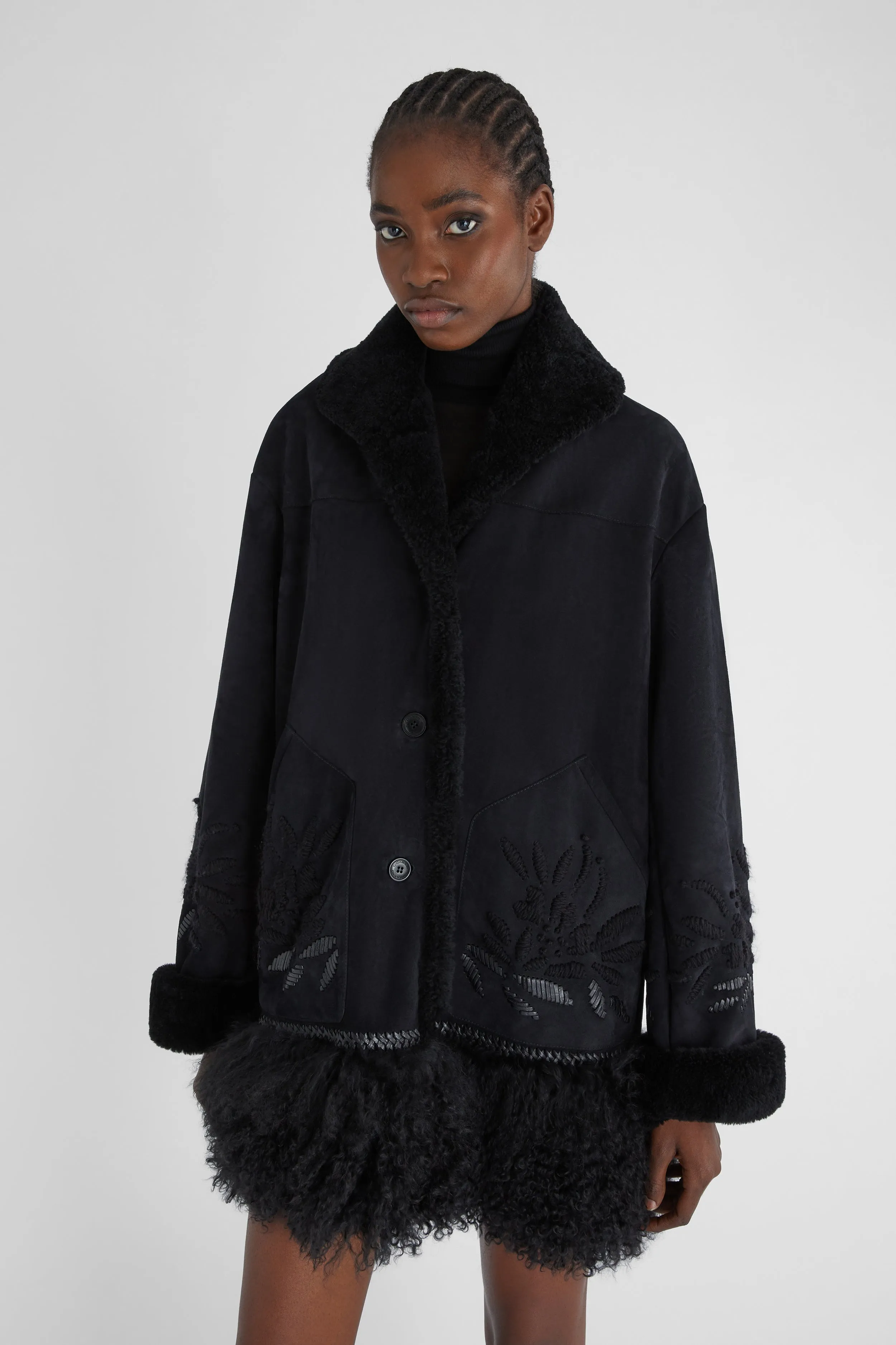 Single-breasted shearling with hand embroidery and fur on the bottom