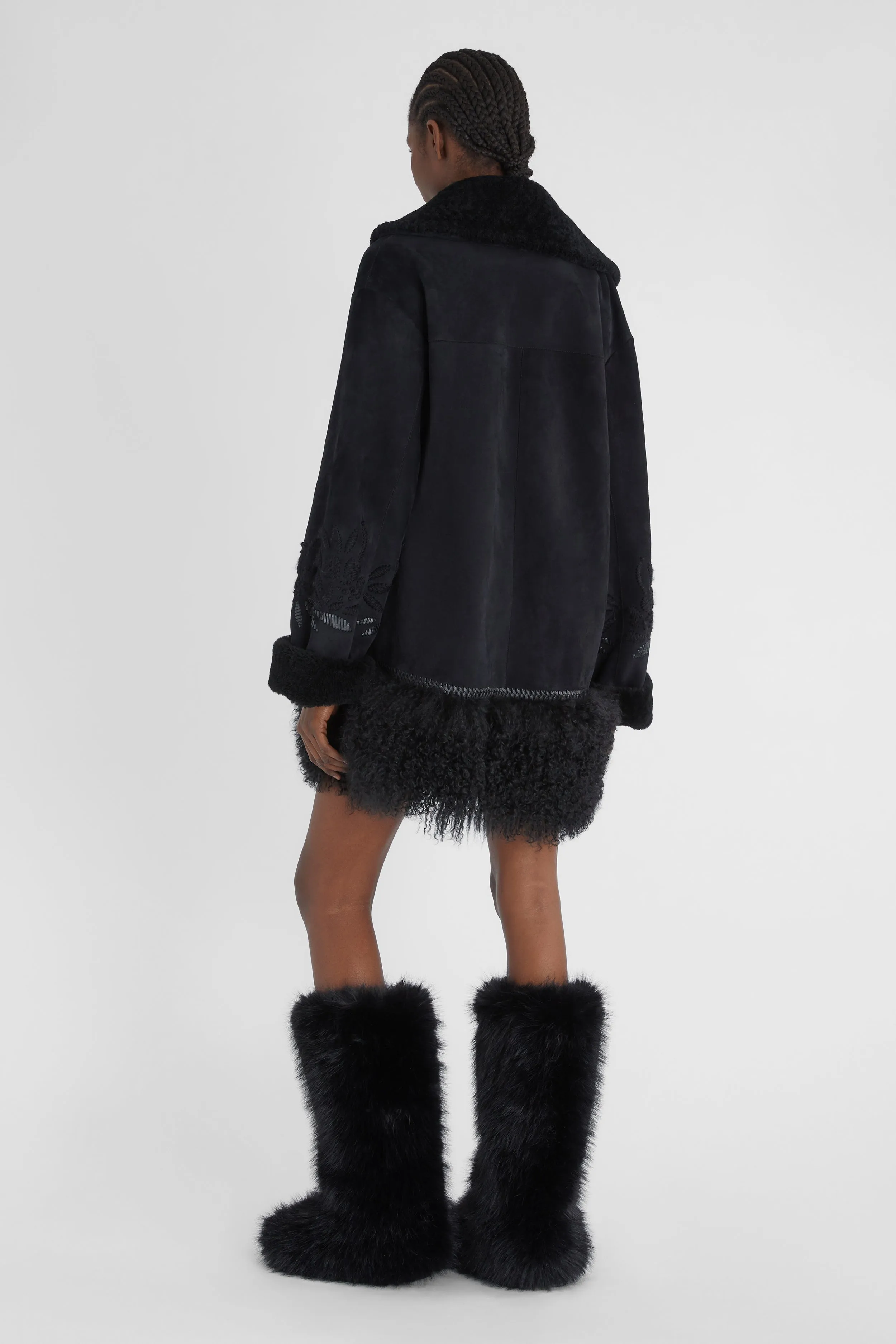 Single-breasted shearling with hand embroidery and fur on the bottom